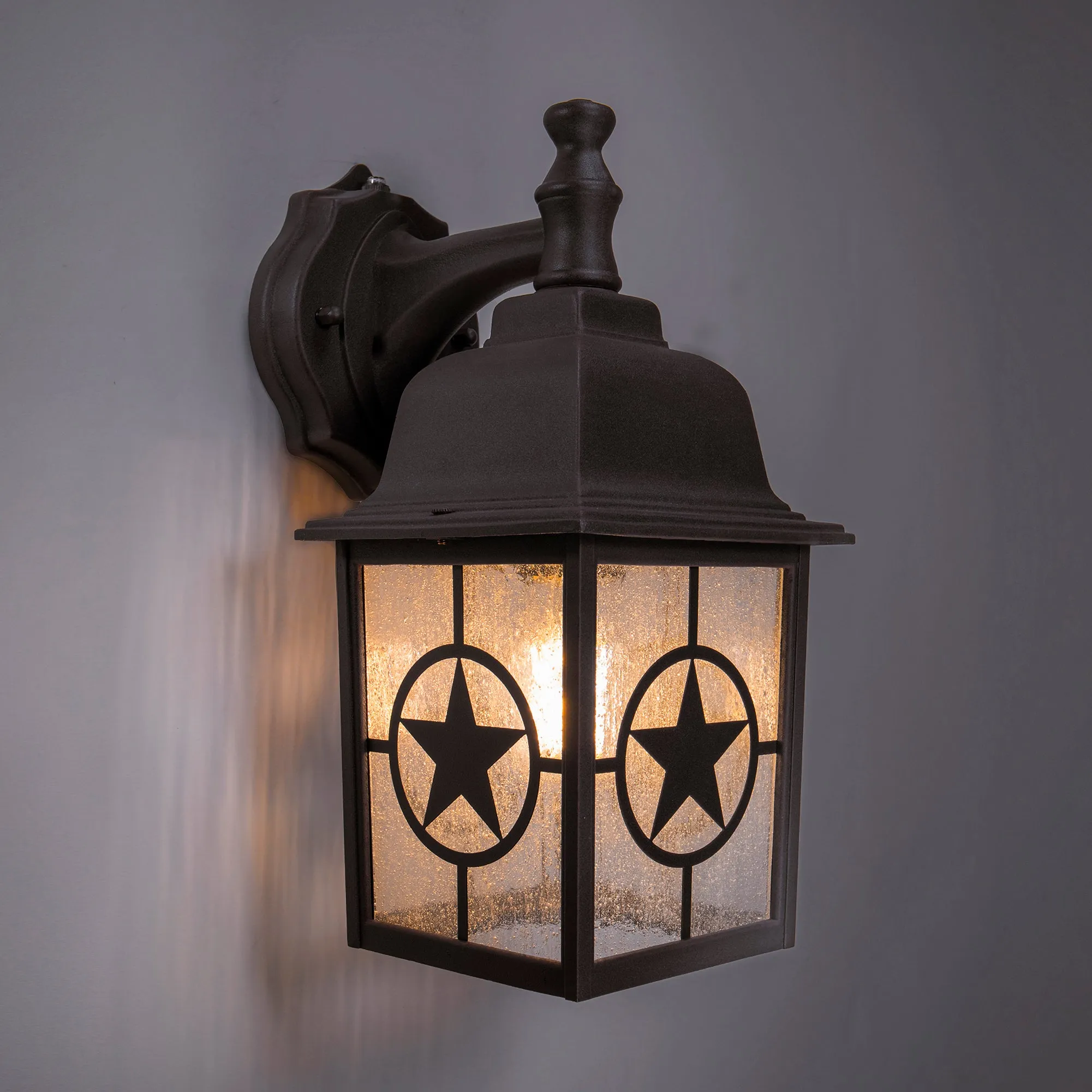 Country Star Dusk to Dawn Farmhouse Wall Light, E26 Standard Socket, Wet Location, Seedy Glass, Black and Rust Finish